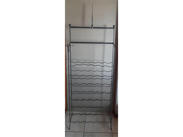 ~/upload/Lots/51488/6yu6cch6irfae/Lot 033 Steel Wine Rack 48 Bottles_t600x450.jpg